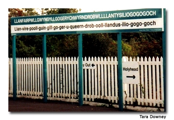 This sign makes the attempt to pronounce the town’s name a little easier.